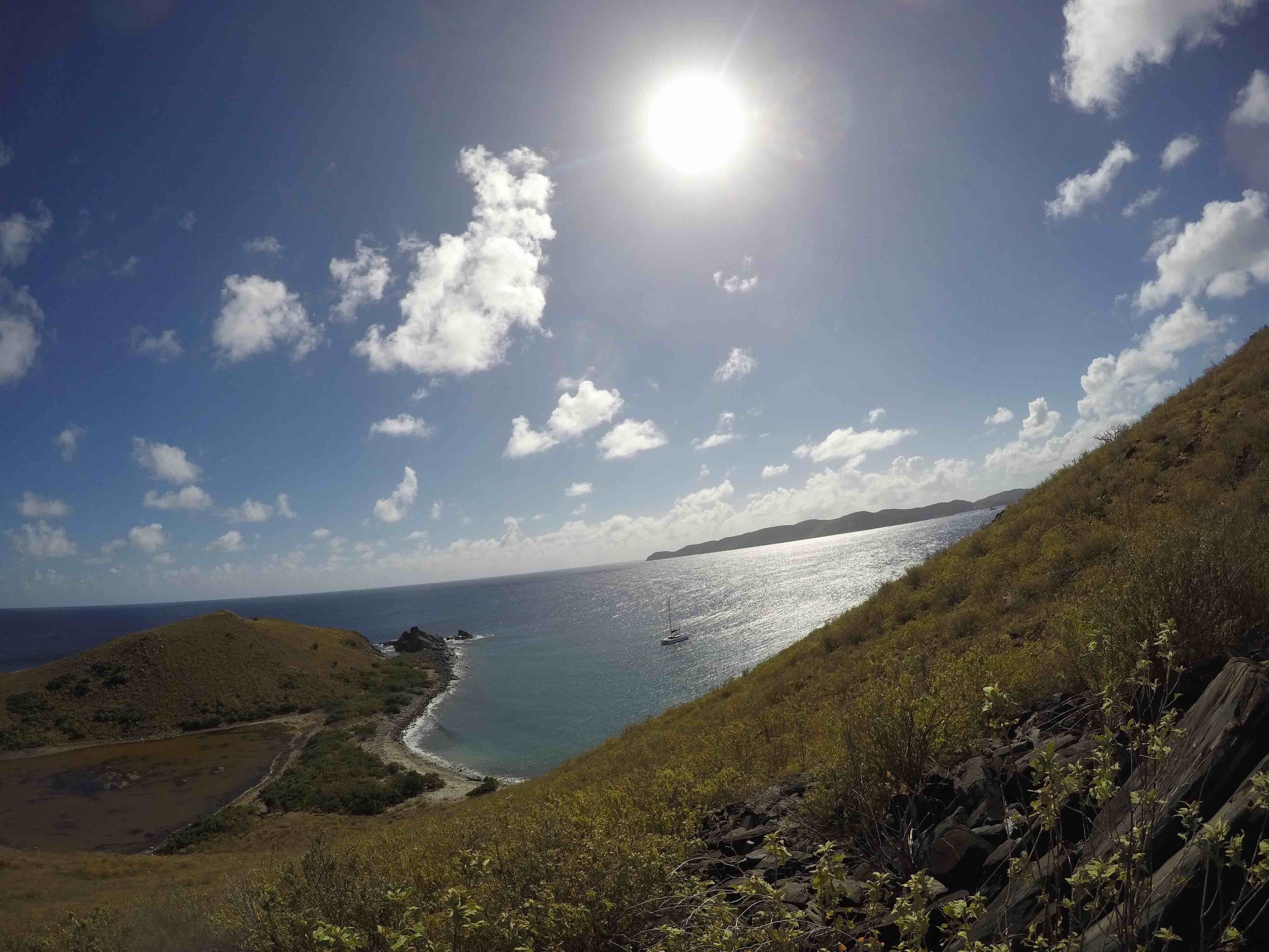 Salt island used to mine salt. But now it’s abandoned. Only goats roam it now. Down there’s my boat.

That rock outcrop off to the left of the boat is what the HMS Rhone hit in a hurricane ~150 years ago.  You can snorkel and dive that wreck.