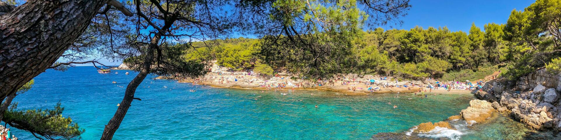 Panorama View of Cyclone Beach in Croatia. Beautiful Summer Sunny Paradise with Adriatic Sea in Pula.