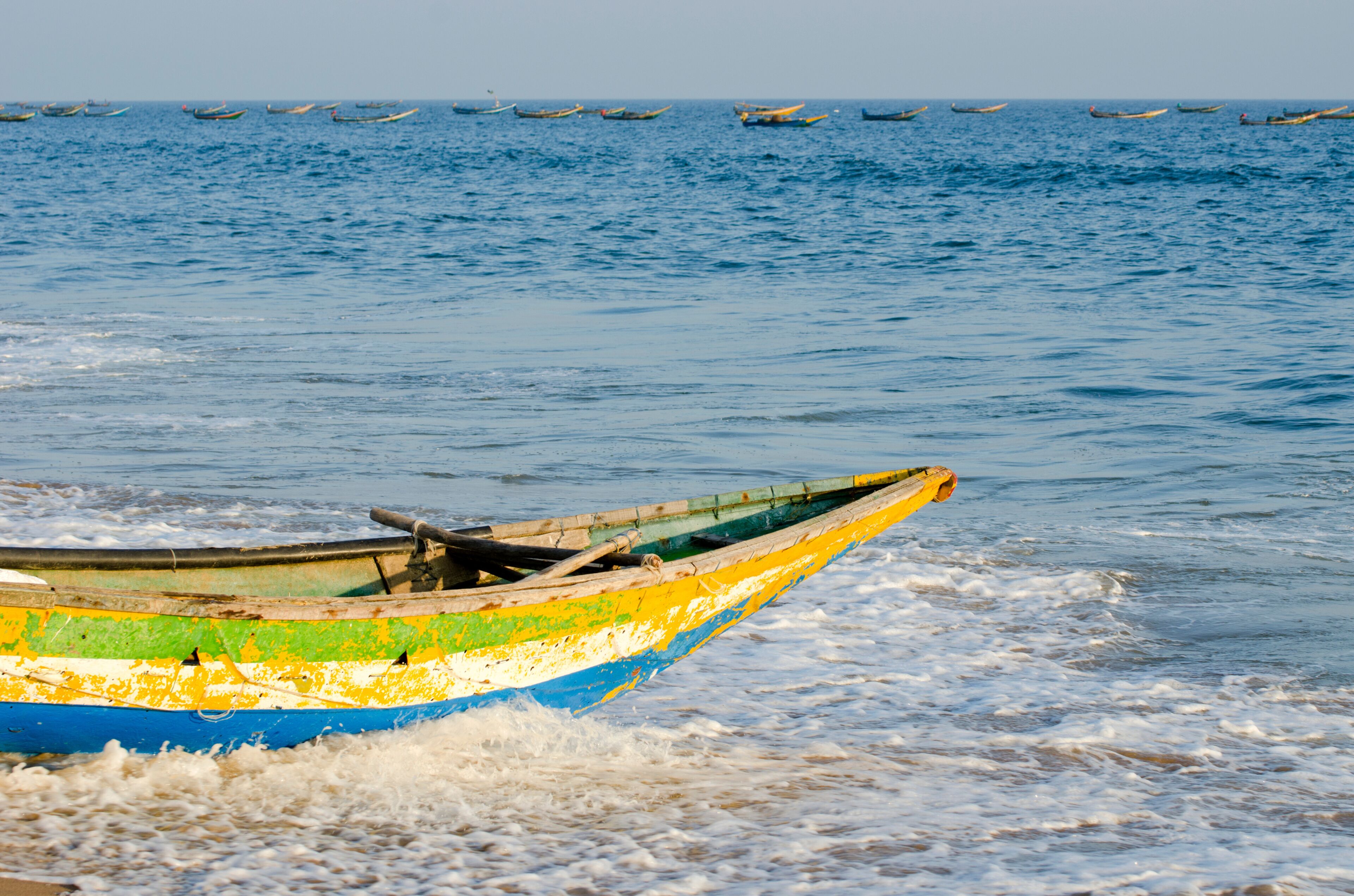 colorful wooden fishing boat on sea
