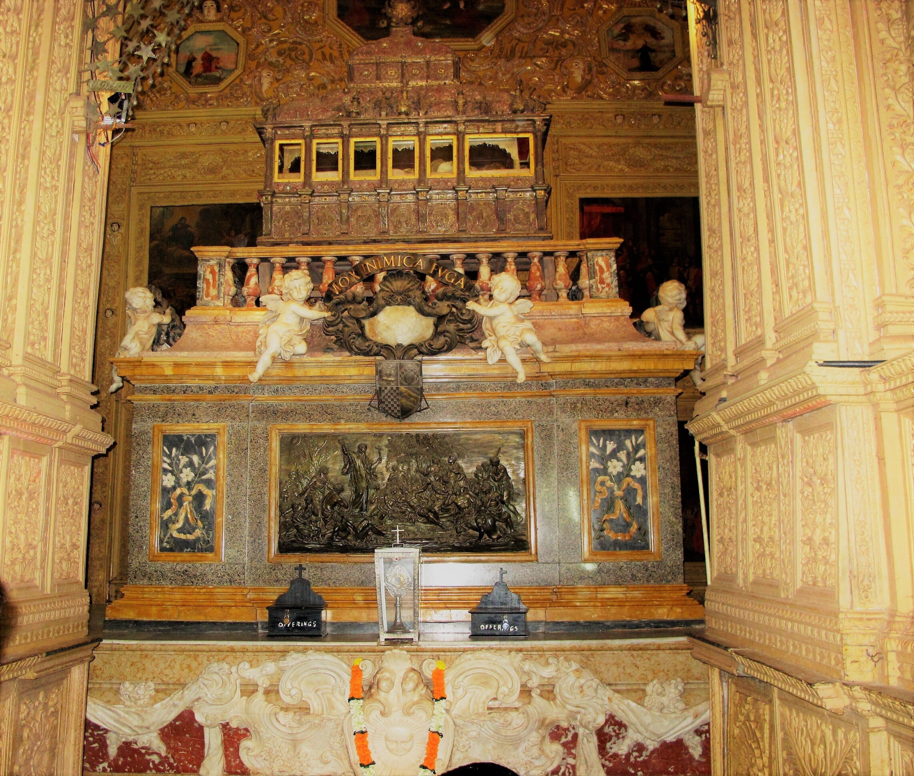 The tomb of St. Francis Xavier housed in the Basilica of Bom Jesus. #Details

Built at the end of the 16th century, the Basilica of Bom Jesus meaning Good or Infant Jesus is a UNESCO World Heritage Site. It holds the mortal remains of St. Francis Xavier, who went to India from Portugal to preach the gospel and do missionary work in Goa and other Portuguese provinces in India at the time.  #Details