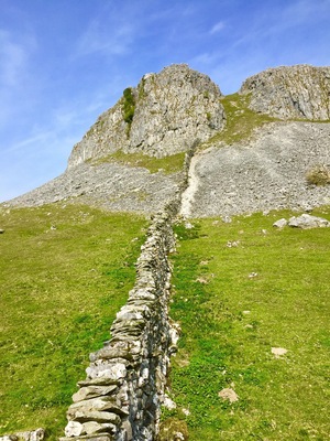 Drystone wall heading up onto Robin Proctor’s Scar. The Scar is popular with rock climbers.