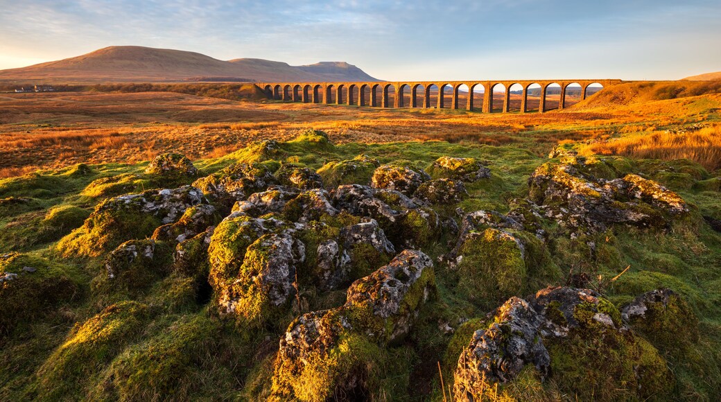 Wide angle view of Ribblehead Viaduct on a beautiful sunny morning. Yorkshire Dales National Park, UK.