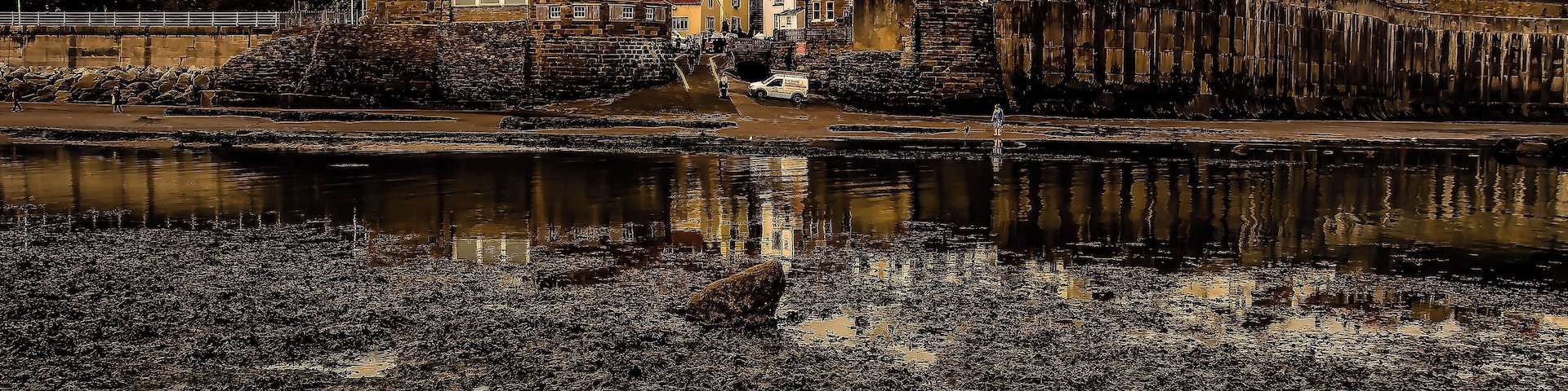 When the tide is out is a great time to get out and look back at the old town of Robin Hoods Bay...one of the very old smuggling towns..its said that all the rooftops are all open so you can go from house to house all the way through the town with been seen.
