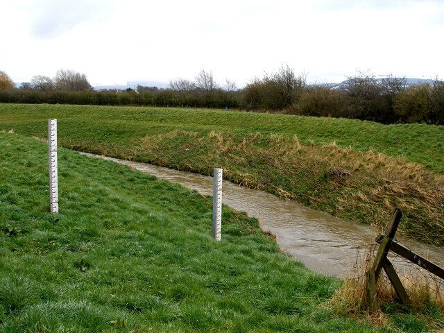 Flood height markers on the bank of the Leven