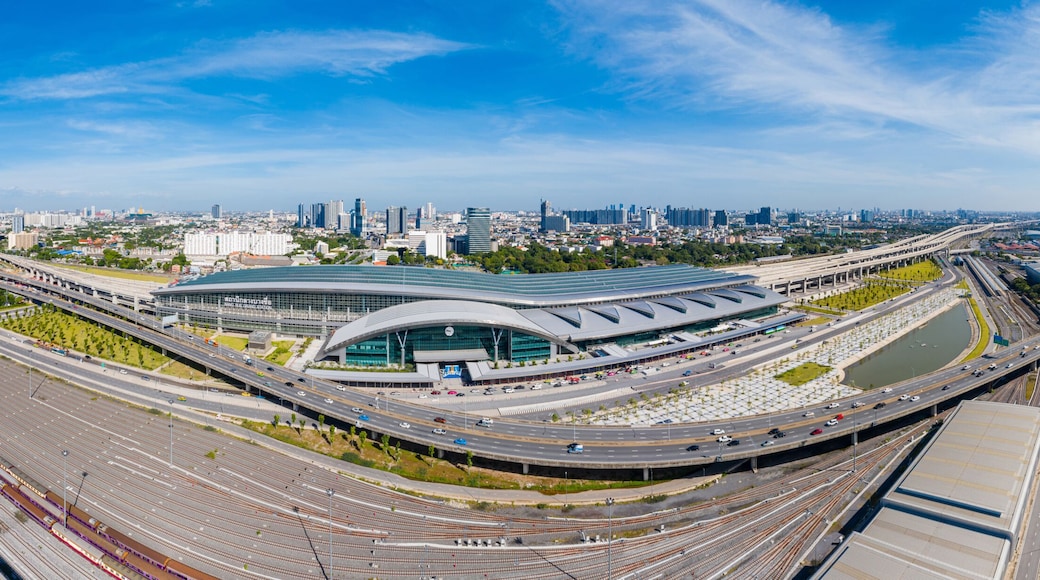 Panoramic view of Bangkok skyline with new Bang Sue Grand Station in Bangkok, Thailand. Aerial view of Passenger and freight trains. Expressway top view