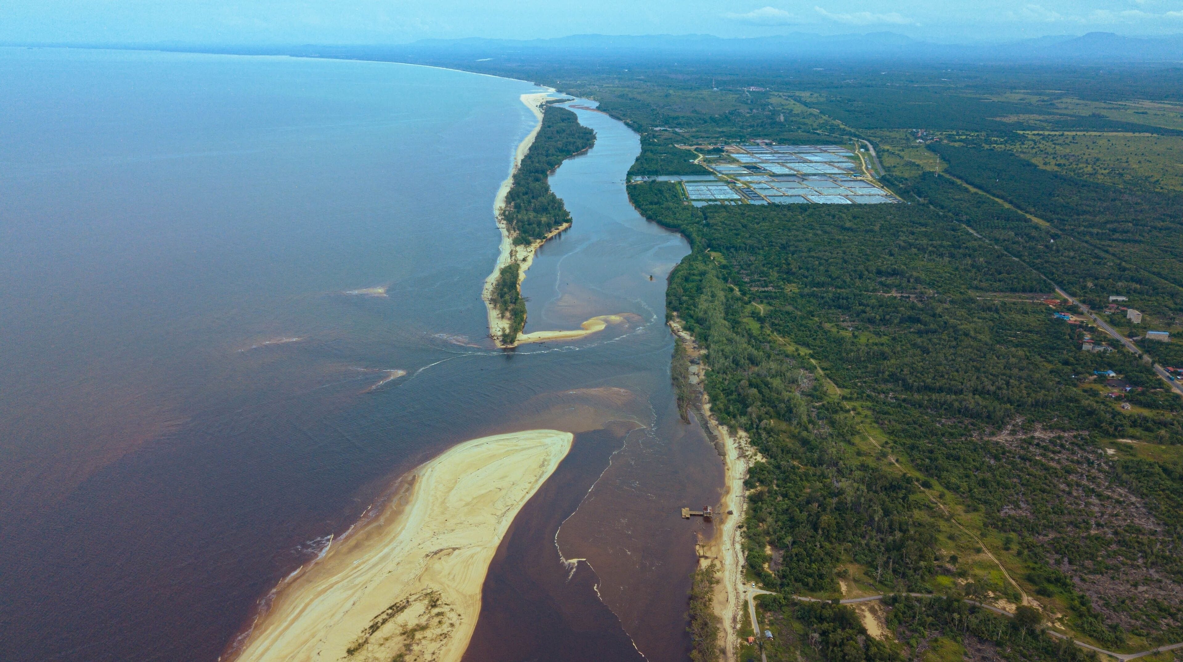 Aerial drone view of coastline scenery in Kampung Badong, Kuala Rompin, Pahang, Malaysia
