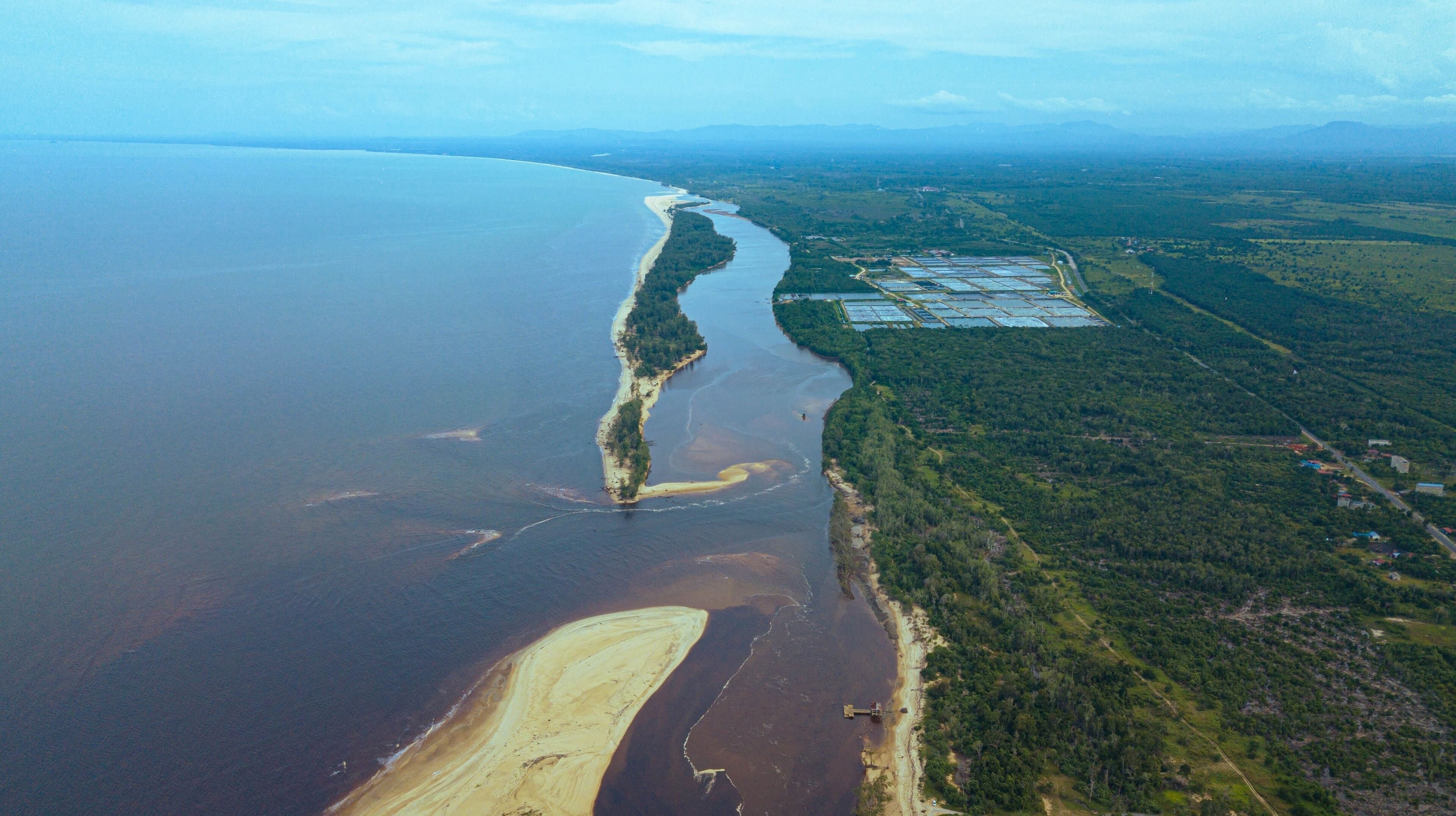 Aerial drone view of coastline scenery in Kampung Badong, Kuala Rompin, Pahang, Malaysia