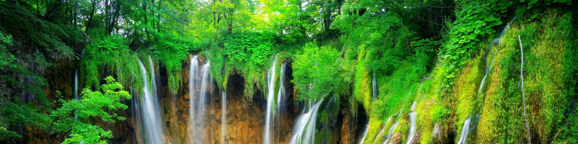 Exotic waterfall and lake landscape of Plitvice Lakes National Park, UNESCO natural world heritage and famous travel destination of Croatia. The lakes are located in central Croatia (Croatia proper).