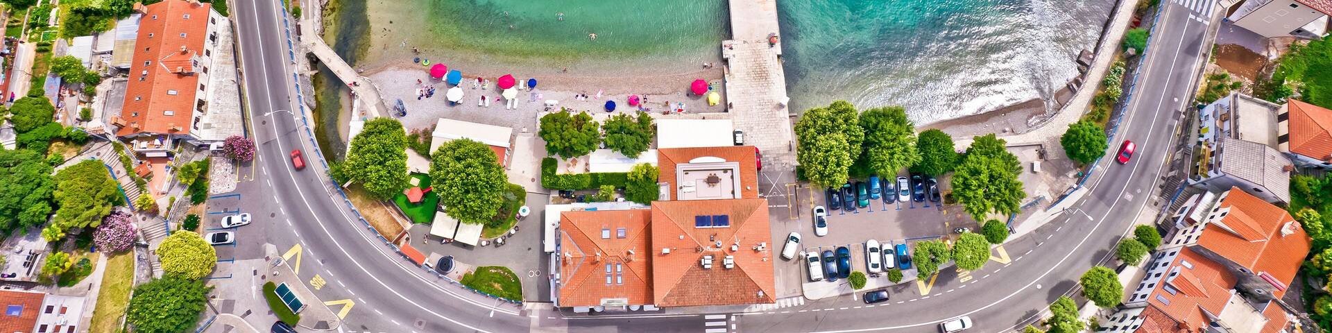 Ika village beach and waterfront in Opatija riviera aerial view