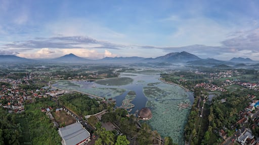 Aerial view of Situ Bagendit is a famous tourist spot in Garut with mountain view.