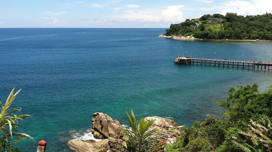 Scenic viewpoint while driving along the coast in Phuket, Thailand. While you may want to spend all of your days sunning on the beach, take at least one day to rent a motorbike and explore the island. You will come across a number of spectacular viewpoints!
