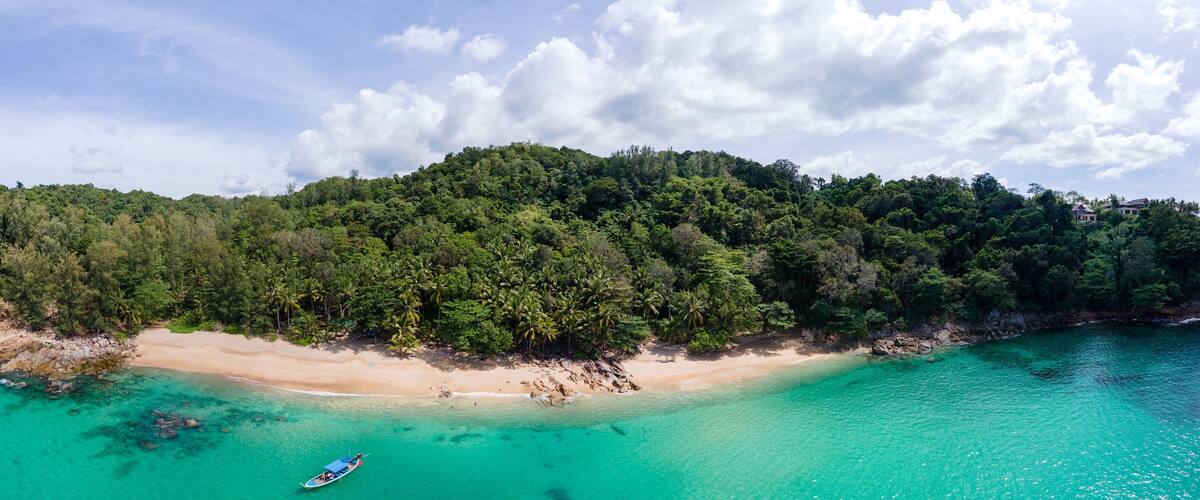 Banana Beach, Phuket, Thailand,A beautiful tropical beach with palm trees at Phuket island, Thailand, Banana Beach Located in Choeng Thale, Thalang, Phuket Province, Thailand. High quality photo