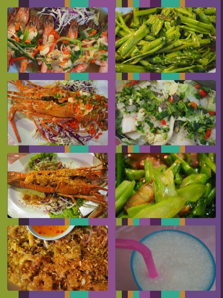 Variedad de platos de mariscos, incluyendo camarones, langosta y verduras verdes.
