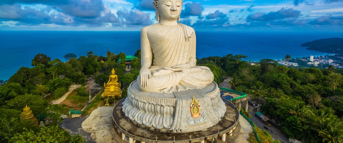 blue sky and blue ocean are on the back of Phuket Big Buddha.