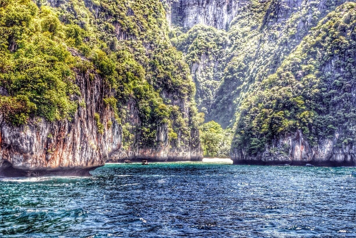 On the way to Phi Phi. Always wondered what lay beyond that turn. Travel tip - hire a speedboat. Expensive , but I did see them going into little corners I was dying to explore 