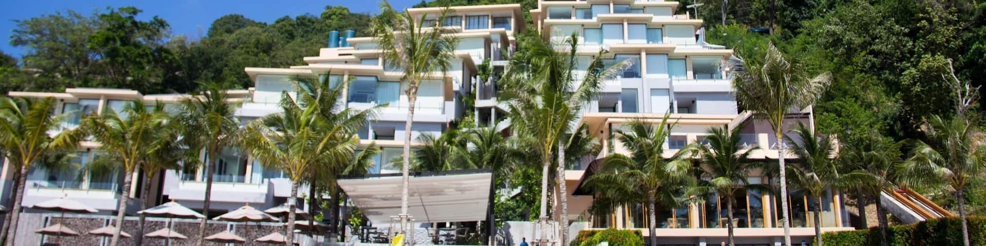 This hotel has an unbeatable view and access to a beach. It also has its own pool right next to the beach. But some of the units have private pools at the attached the balconies.