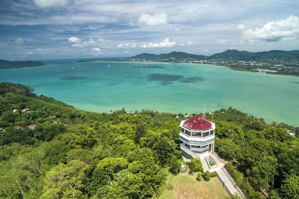 Aerial snap of Khao Kad Views Tower on the southeast coast of Phuket Island. This viewpoint offers a great vista of Chalong Bay. You'll find onsite a small store selling snacks and fresh drinks. To get there, take the road that leads to Cape Panwa from Phuket City. You'll see signboards indicating the viewpoint on the road. #LifeAtExpediaGroup