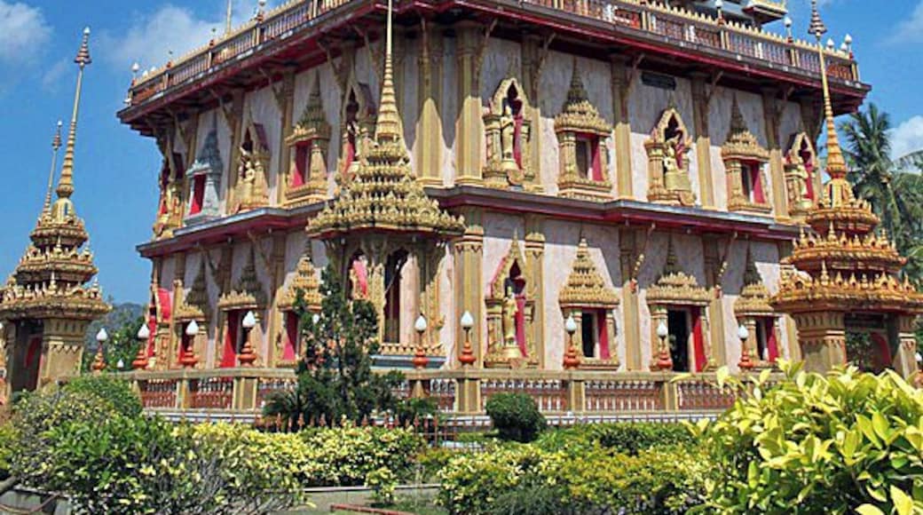 Not far from Phuket Town is the stunning Wat Chalong. Weâve visited a lot of wats in South East Asia, and this one certainly had its own unique flare.
The Grand Pagoda dominates the temple groundsâitâs cool and breezy location makes it just as popular as the splinter of Buddhaâs bone that rests inside. The pagoda walls depict Buddhaâs life story and immense golden statues of the various Buddha poses sit in the main hall. Choose the one you wish to worship to most.
Pay attention to the fire crackers going off inside the brick oven out the front of the ordination hall. Thai people set them off to celebrate if they receive any good luck.