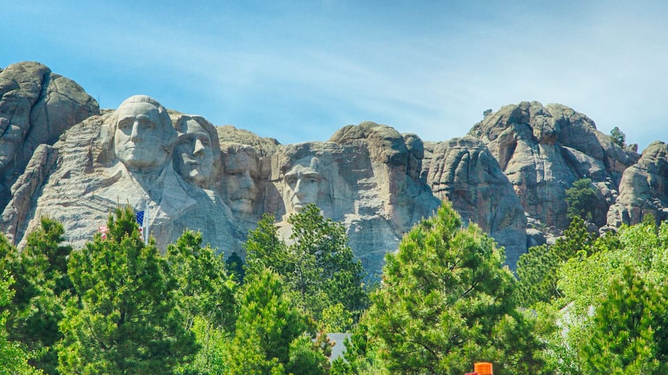 Mount Rushmore with the faces of four U.S. presidents carved into the rock.