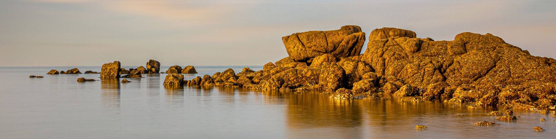 Winter and morning view of rocks on the sea at Seonnyeobawi Beach of Eulwang-ri near Yongyudo Island, Incheon, South Korea