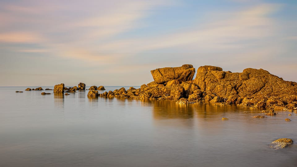 Winter and morning view of rocks on the sea at Seonnyeobawi Beach of Eulwang-ri near Yongyudo Island, Incheon, South Korea