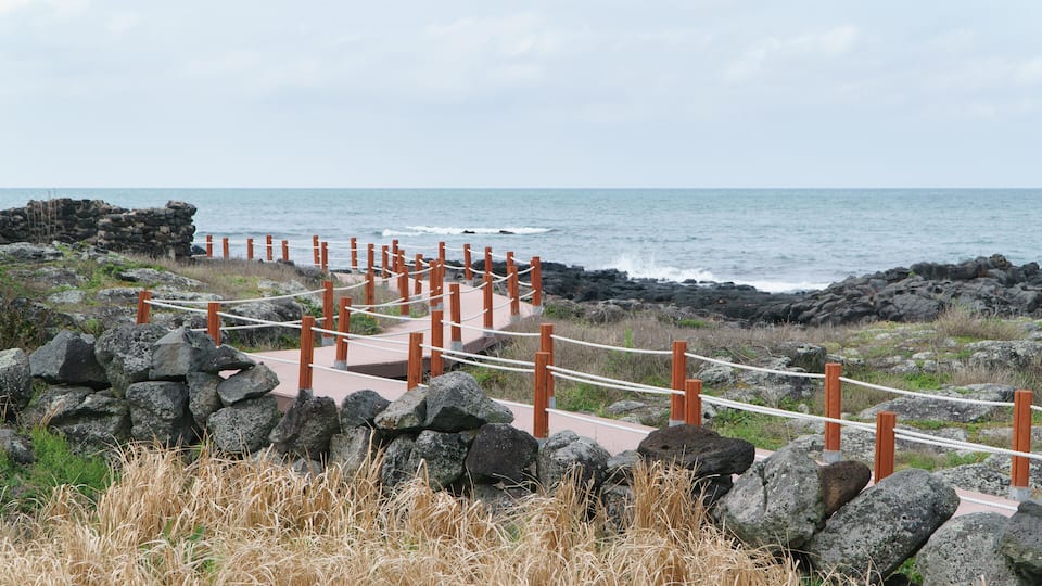 EP767Y trail with rope banister at a coast near the Aewol port in Jeju Island, Korea.