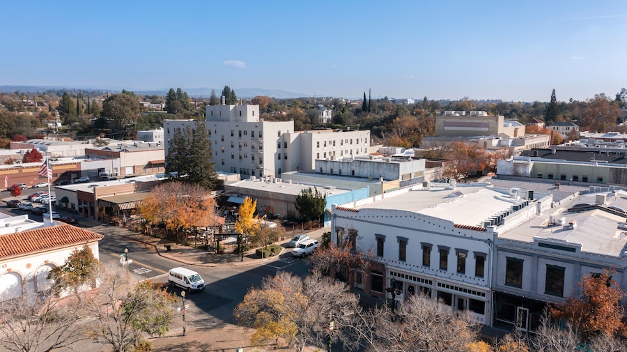 Oroville, California, USA - November 23, 2021: Late afternoon sun shines on historic gold rush era downtown architecture.