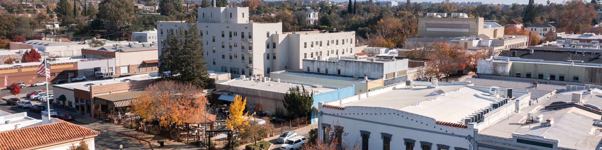 Oroville, California, USA - November 23, 2021: Late afternoon sun shines on historic gold rush era downtown architecture.
