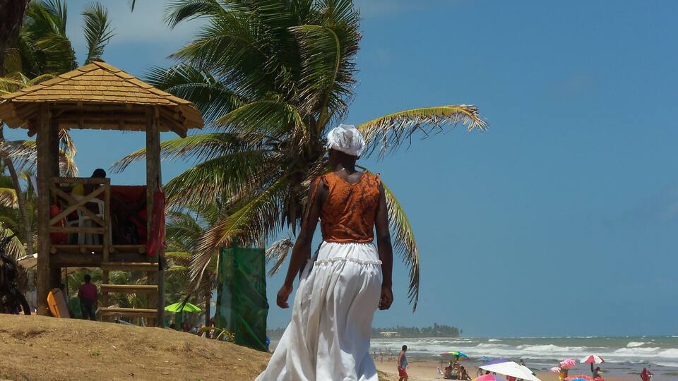 A Brazilian woman of African descent, wearing traditional clothes from the state of Bahia in Villas do Atlantico, Bahia