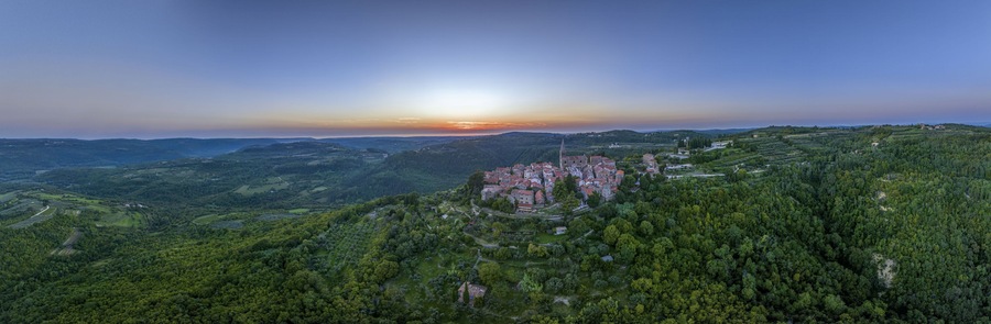 Drone panorama over the historic artists' town of Groznjan in central Istria at sunset
