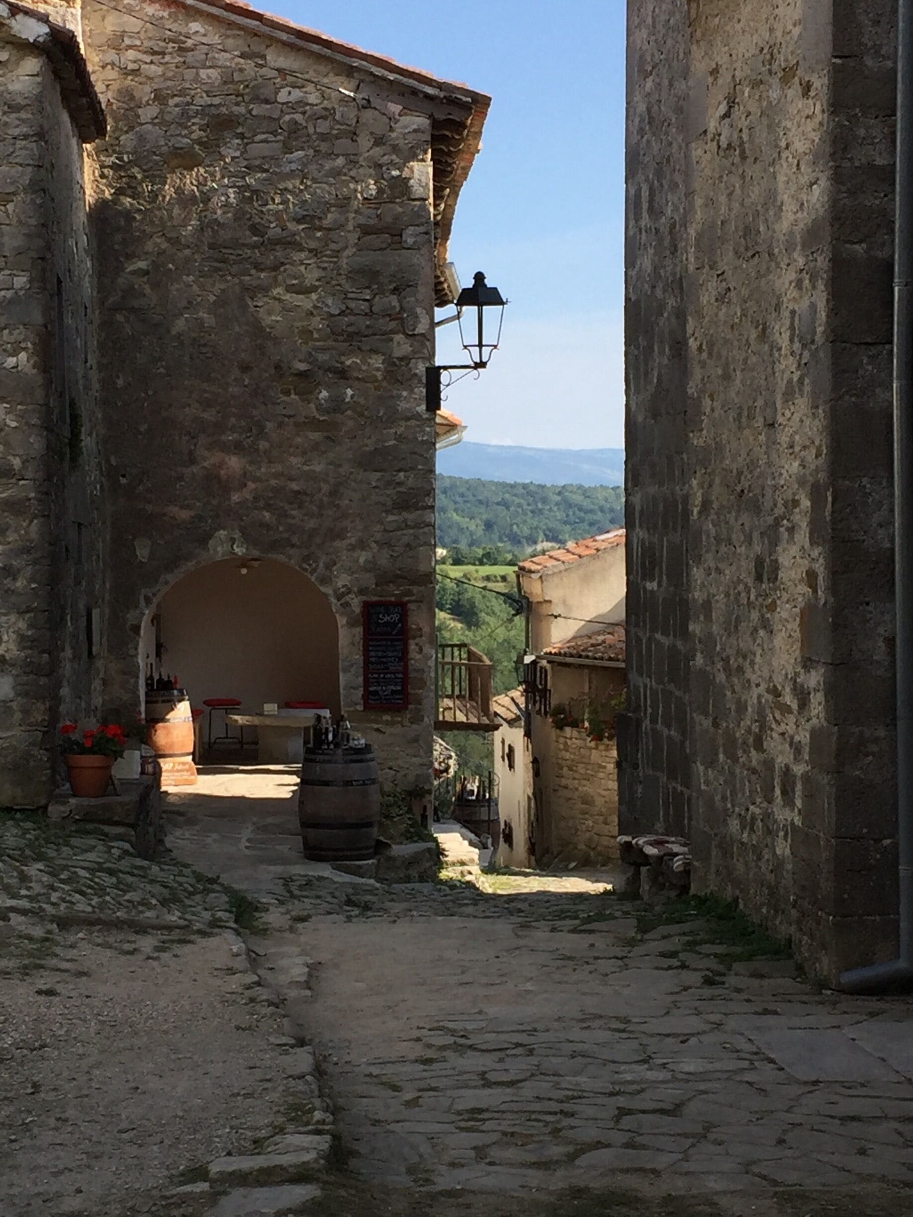 Hum, smallest town in the World...worth a visit just for that alone...has about 14 buildings including a beautiful church, and believe it or not my wife and I still couldn’t find the shop to return to 😂...beautiful scenery and you are met by a busker playing classical guitar as you enter through the town gate...full of Istrian character with a magical romantic feel...❤️
