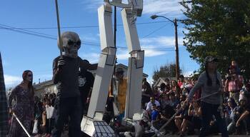 The 25th annual Marigold Parade, also known as Day of the Dead parade, is led by an oversized skeleton through the streets of this largely Hispanic community of southwestern Albuquerque