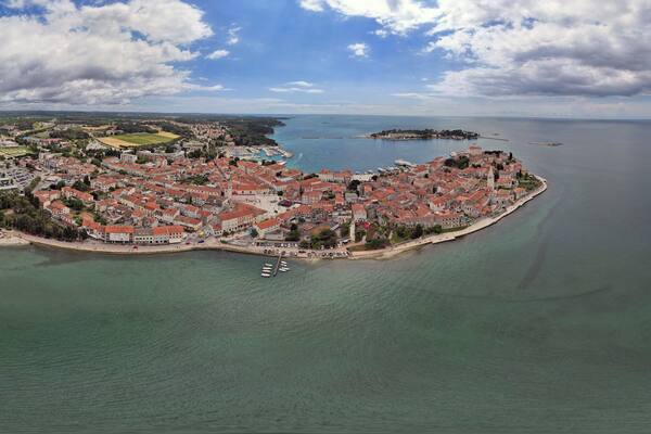 Aerial panorama of Porec harbor and old town, Croatia.