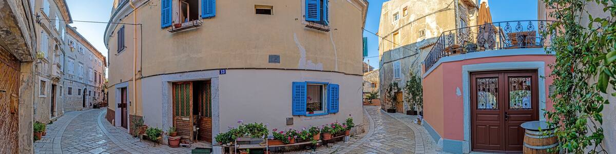 Image of the historical center of the Croatian coastal town of Porec in the morning light during the sunrise