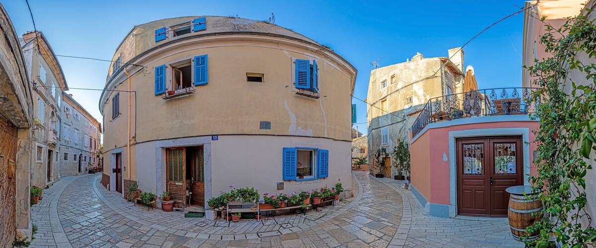 Image of the historical center of the Croatian coastal town of Porec in the morning light during the sunrise
