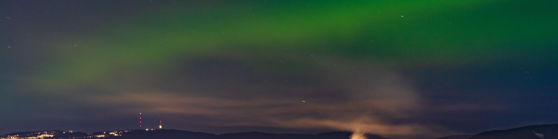 Weak aurora borealis over Oslo