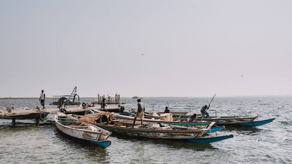 Riverbank with boats floating