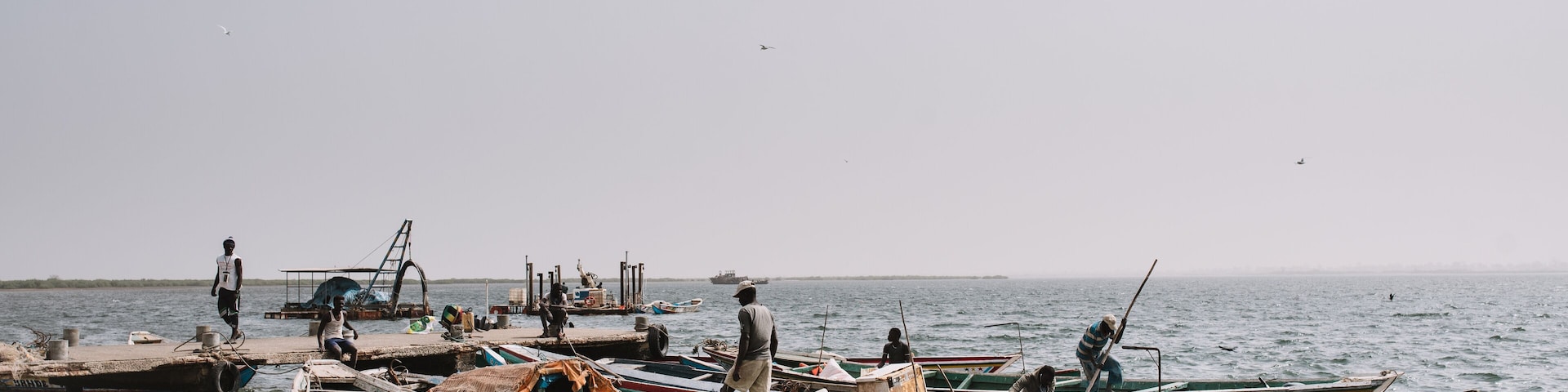 Riverbank with boats floating
