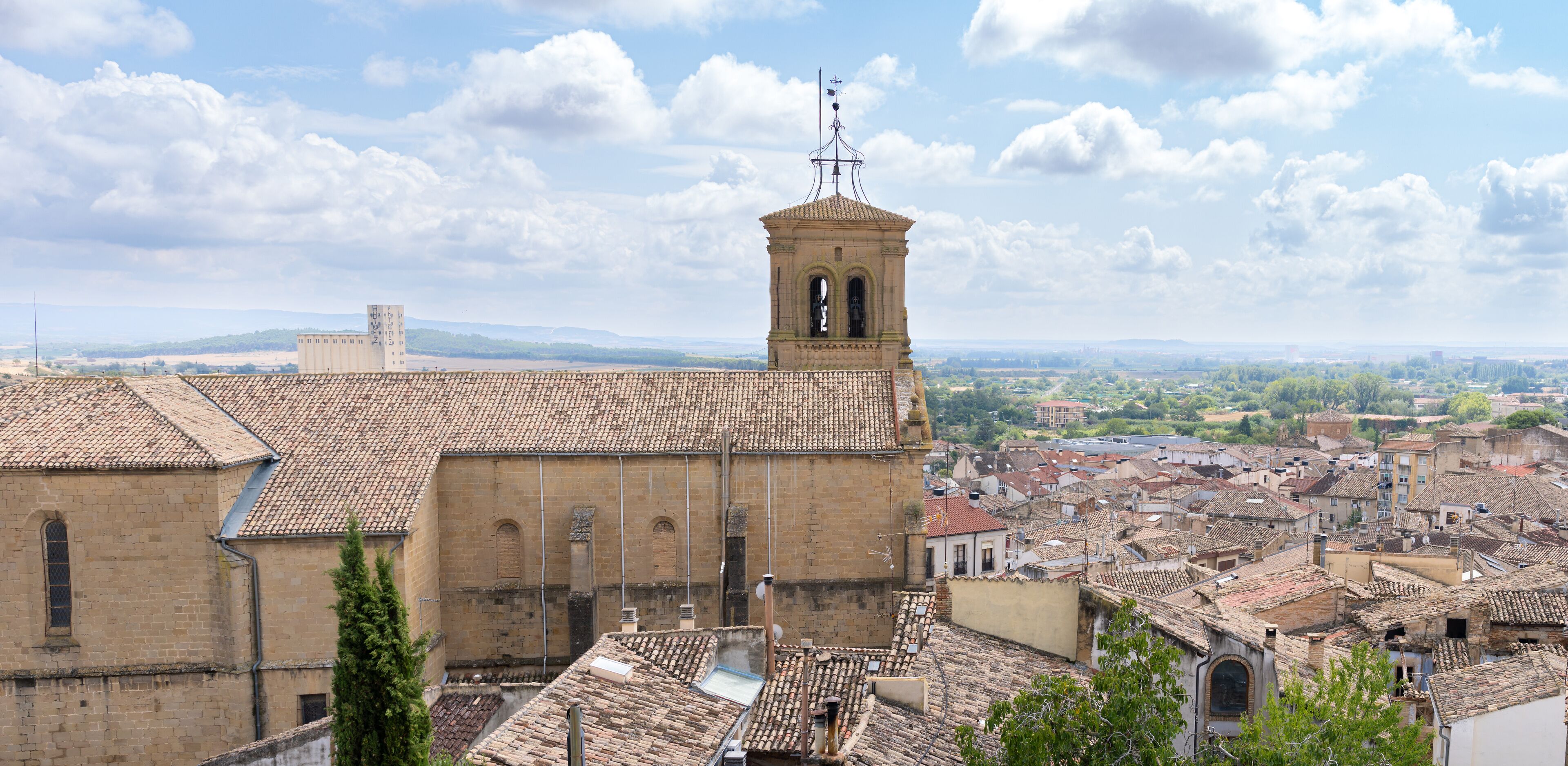 View from the church and the city of Tafalla (Navarre, Spain) from top of the hill in a cloudy summer day