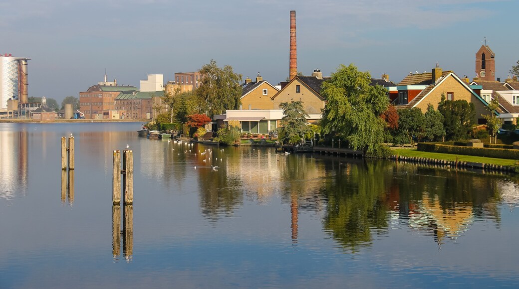 View of Halfweg from Zwanenburg through the canal Ringvaart, the