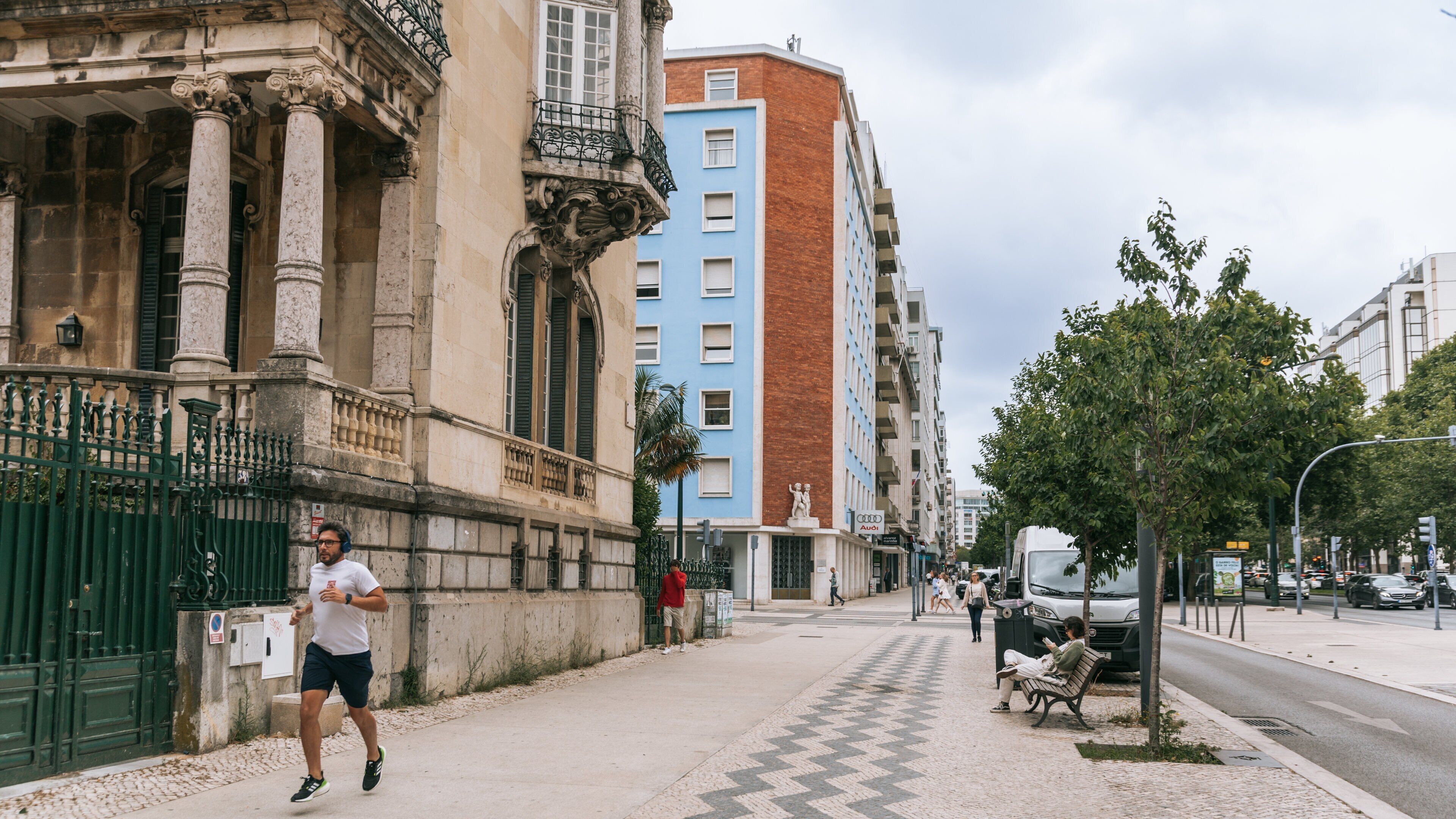 Avenidas Novas featuring street scenes as well as an individual male