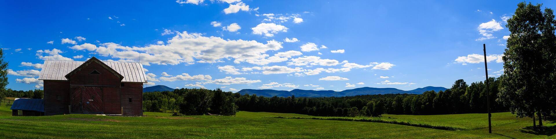 Farmland and barn overlooking Catskill Mountains in the Hudson V