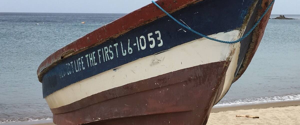 Friendly craftsman line the beach in this quiet town.