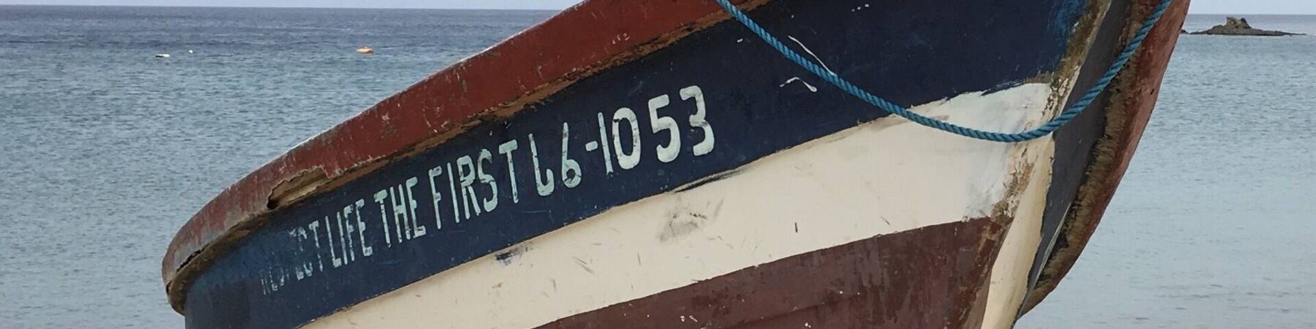 Friendly craftsman line the beach in this quiet town.