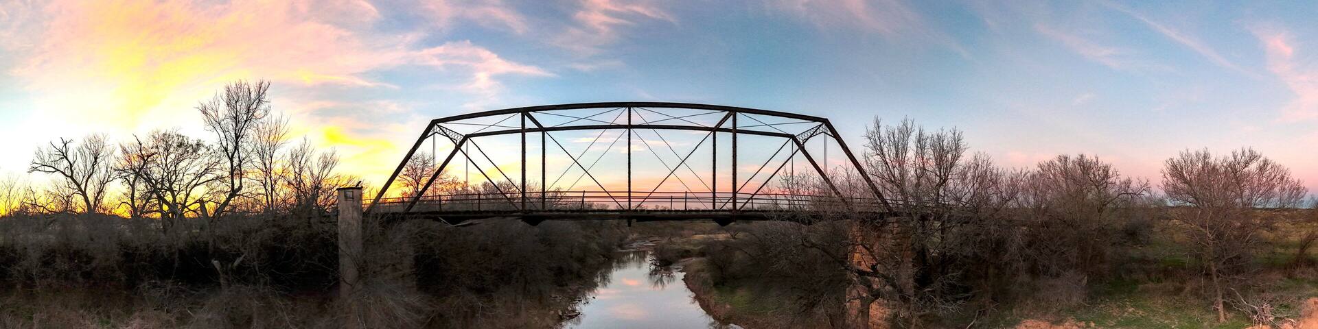 Fort Griffin Bridge of 1885, now condemned. Perfect example of a wagon bridge, built to prevent excessive wear from the wagon wheels.