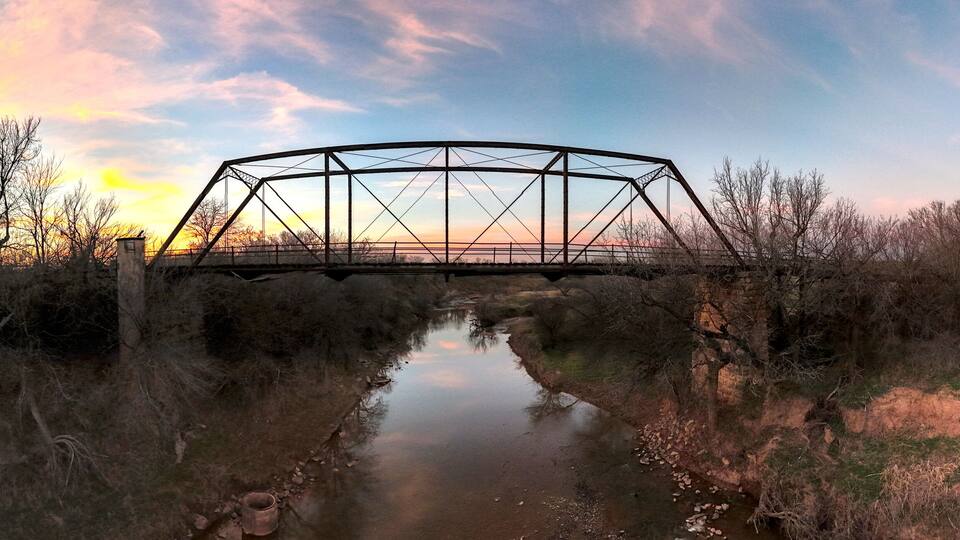 Fort Griffin Bridge of 1885, now condemned. Perfect example of a wagon bridge, built to prevent excessive wear from the wagon wheels.