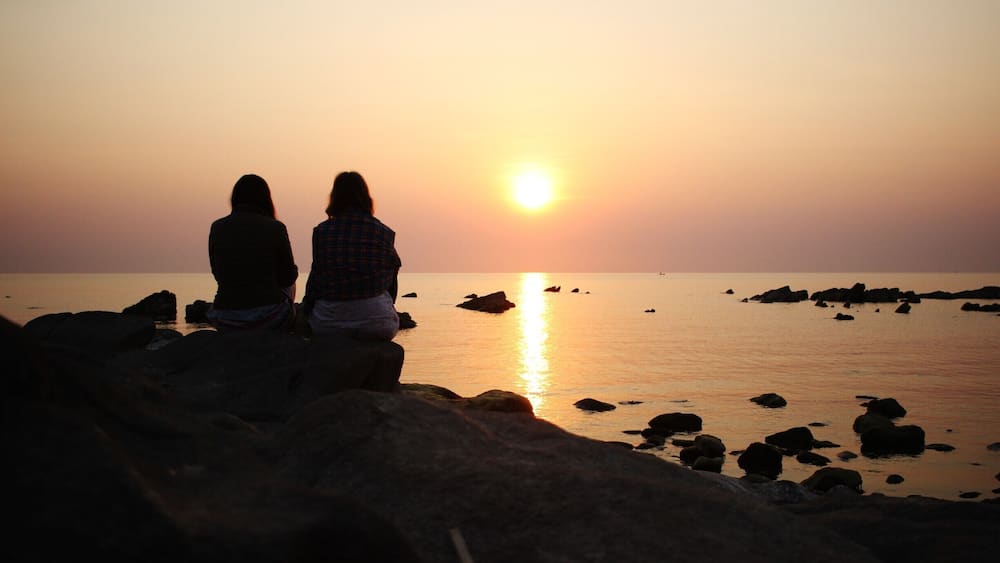 The 2016 Lake of Stars music festival was held at Chintheche Inn in Nkhata Bay on Lake Malawi. Every morning the sun rises above the lake, turning the sky pink and gold. Worth getting up at 5am for.
Even without an amazing festival, Nkhata Bay is worth a visit for its stunning scenery. The area is about a 4-hour drive north of Lilongwe and has several lodges on the shores of the lake.