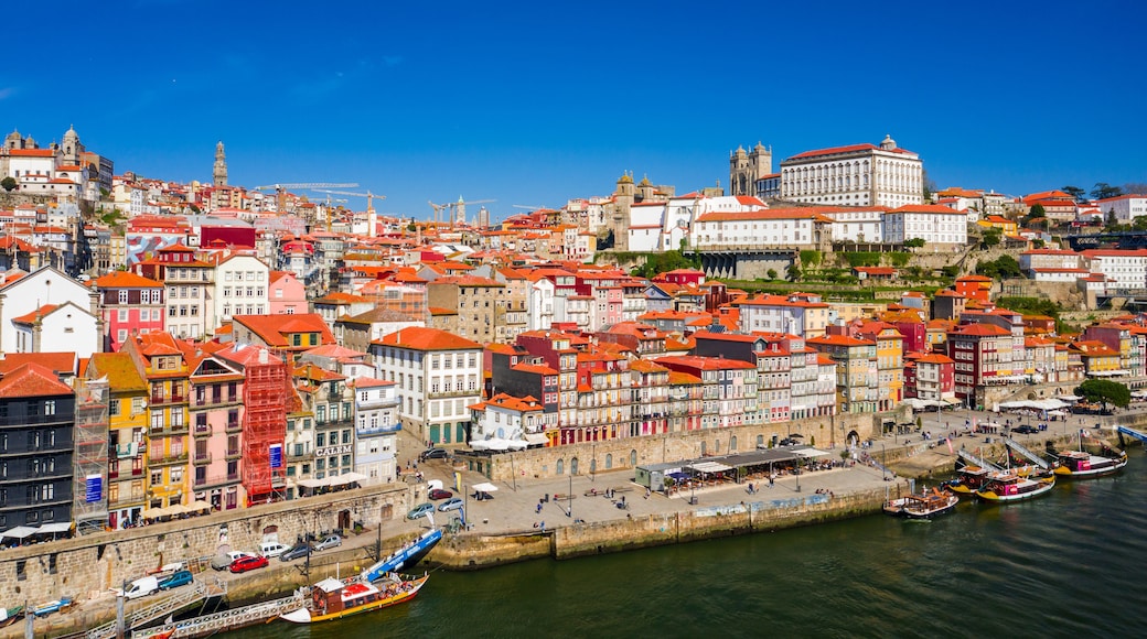 Porto Cityscape with Dom Luis I Bridge over Douro River and medieval Ribeira district at day time, Portugal