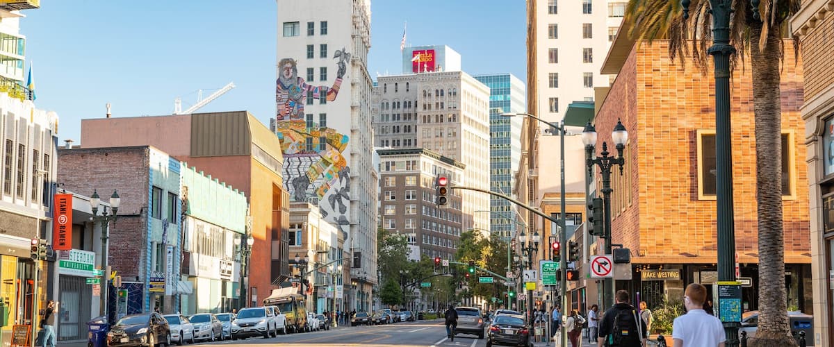 Telegraph Avenue showing street scenes and a city