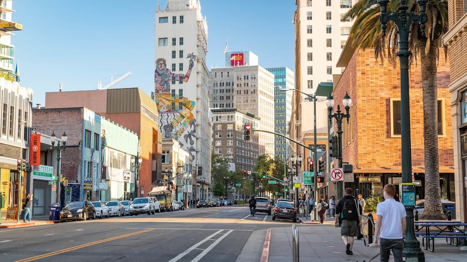 Telegraph Avenue showing street scenes and a city